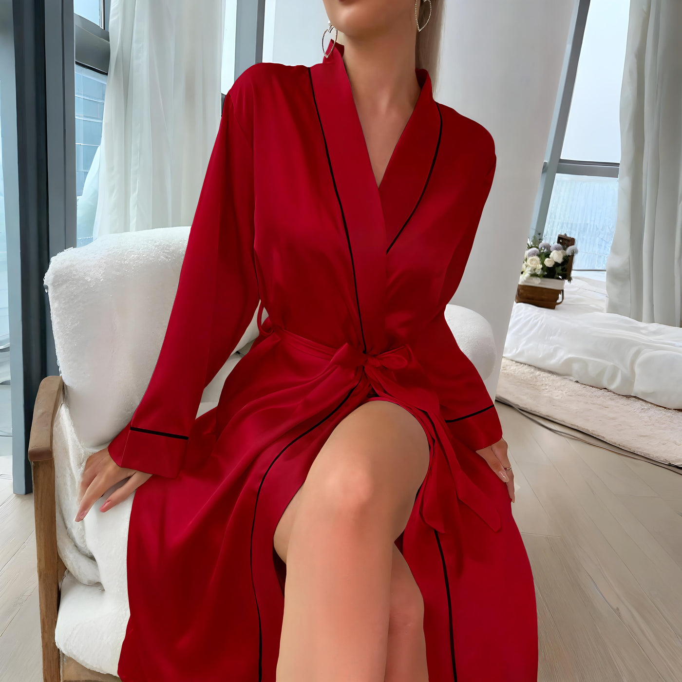 Women’s red satin robe with black trim and waist tie