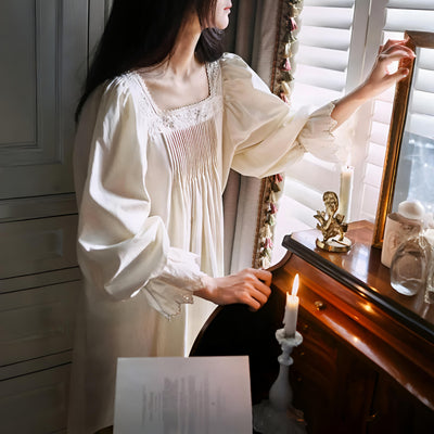 Close-up of lace trim and pleated neckline on apricot nightgown – Velourine Attire