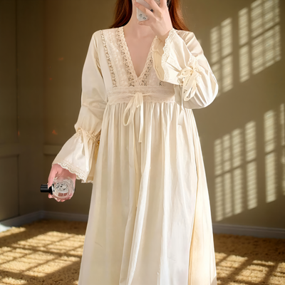 Close-up of lace neckline and ribbon tie on apricot cotton nightgown – Velourine Attire