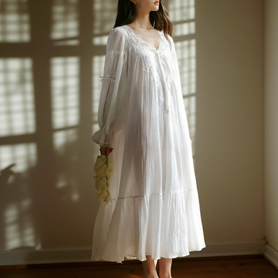 Detailed view Model wearing vintage-inspired white cotton nightdress indoors – Velourine Attire